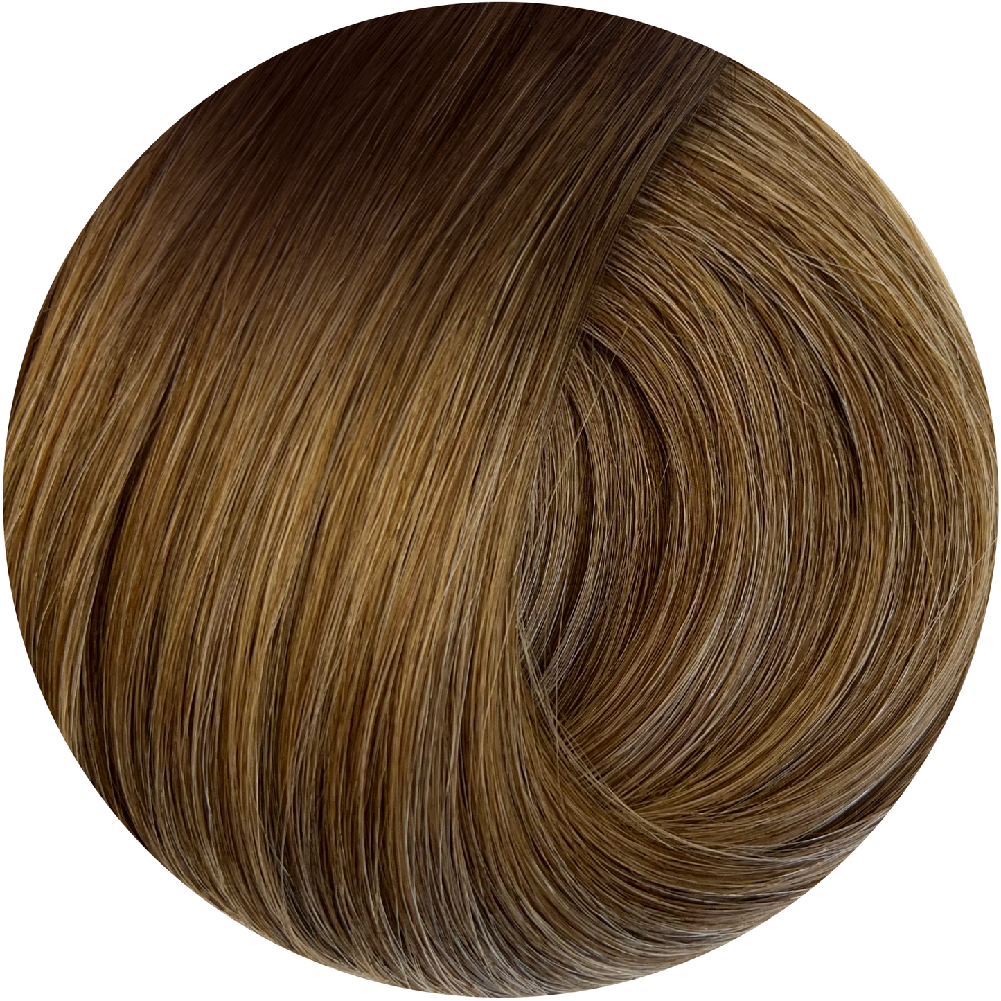 Hot Toddy is a warm, golden brunette that falls between Level 6 and Level 7 on the Redken scale. This rich, caramel-infused shade exudes warmth and radiance, with soft honey undertones that give it a naturally sun-kissed look. Ideal for clients who want a rich, glowing brunette with soft golden hues, Hot Toddy offers depth while maintaining a warm, light-reflecting brilliance. Perfect for adding a cozy, autumnal glow to any hairstyle.
