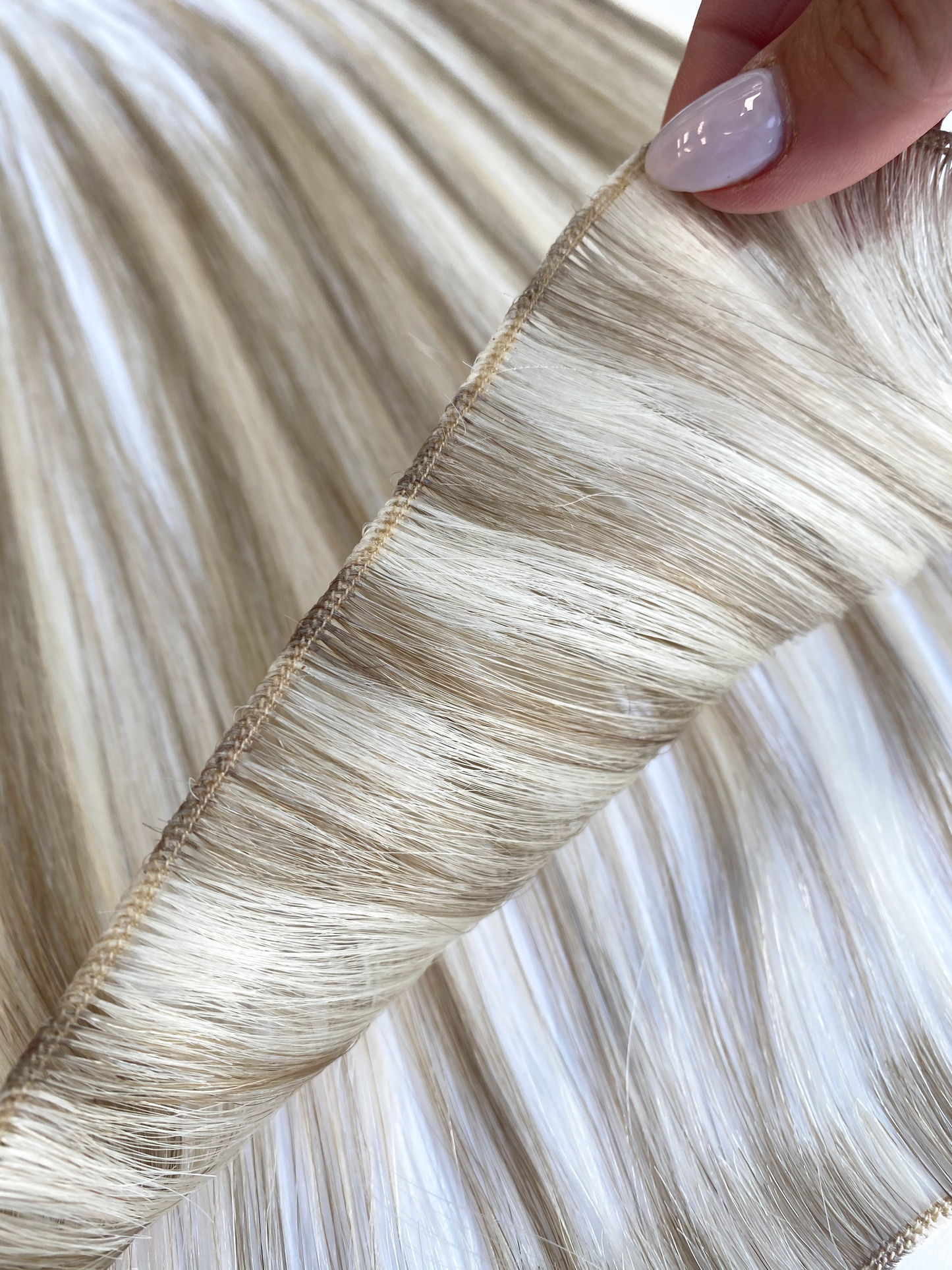KOVI micro weft made form 100% professional grade remy human hair extensions.